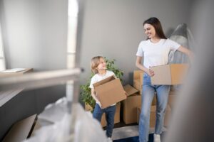 young-family-moving-into-new-home_23-2149196309